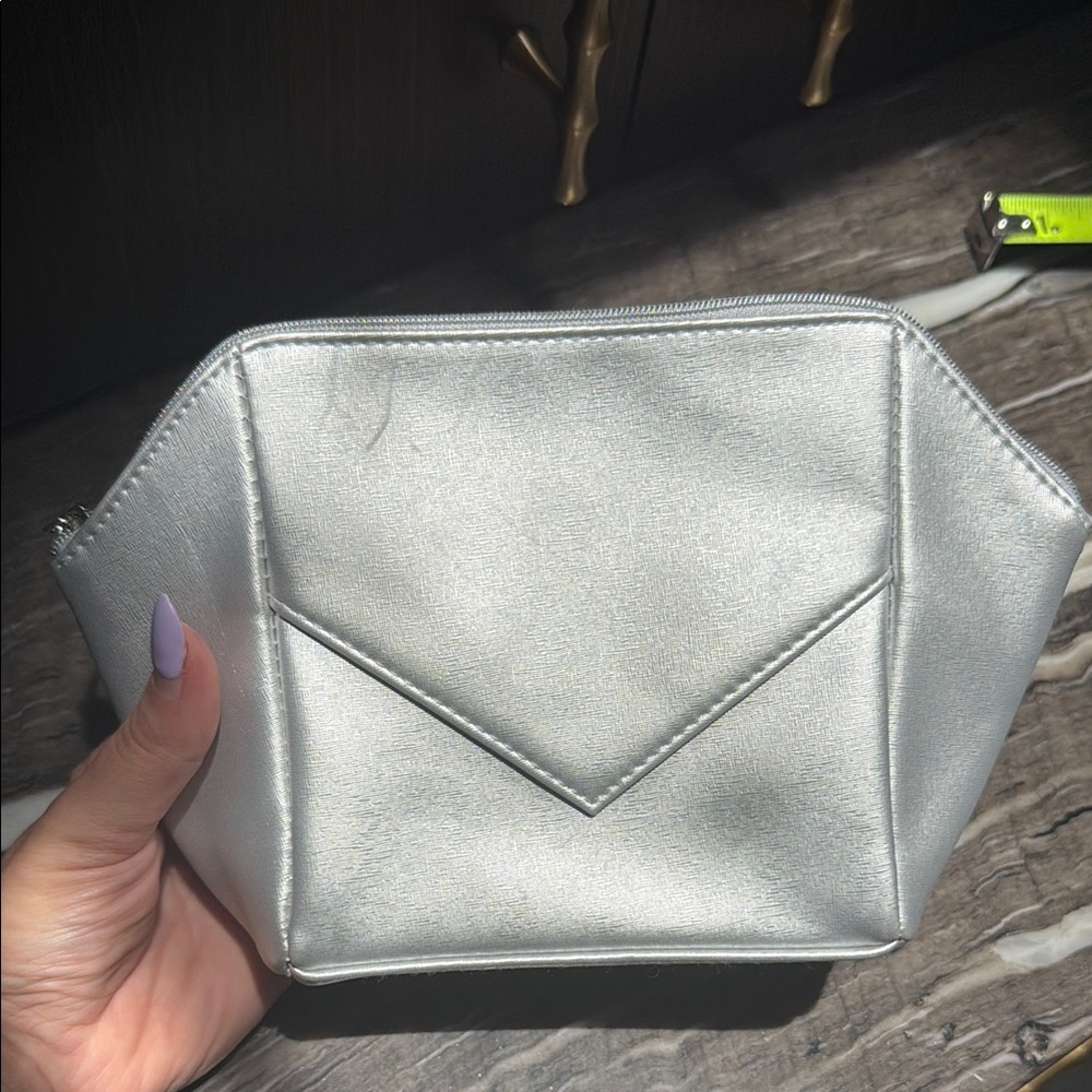 La Prairie Silver Cosmetic Bag with Geometric Design